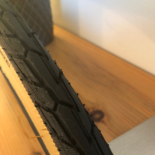 630-Schwalbe (HS484) 27 x 1 1/4 (28/32-630)  Road Cruiser Gum Wall Tire with K-Guard (with Green Compound)